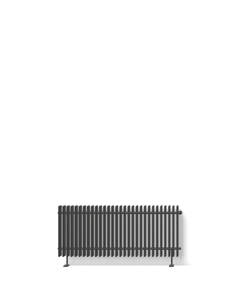 Render: long, low graphite panel on a bone-coloured wall
