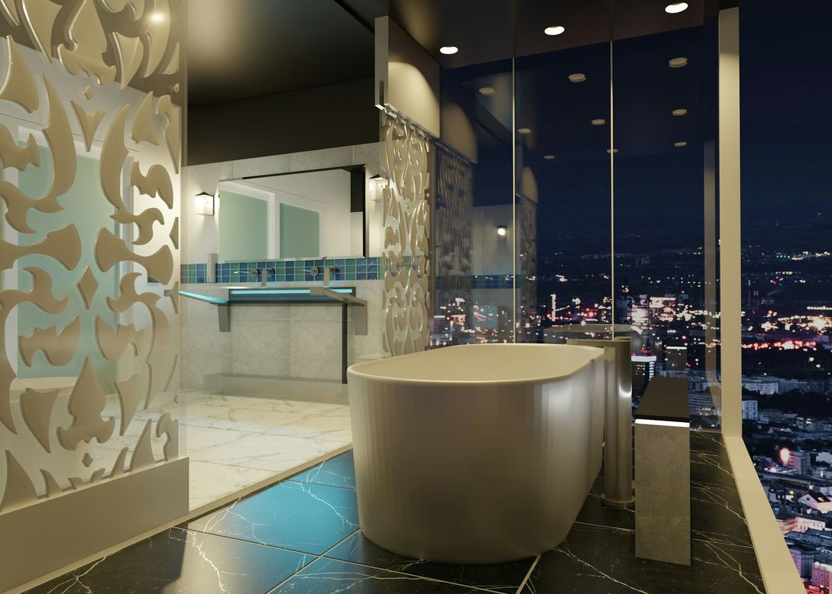 A bathroom with a freestanding tub on black marble, a carved screen, and a glass wall over a city at night.