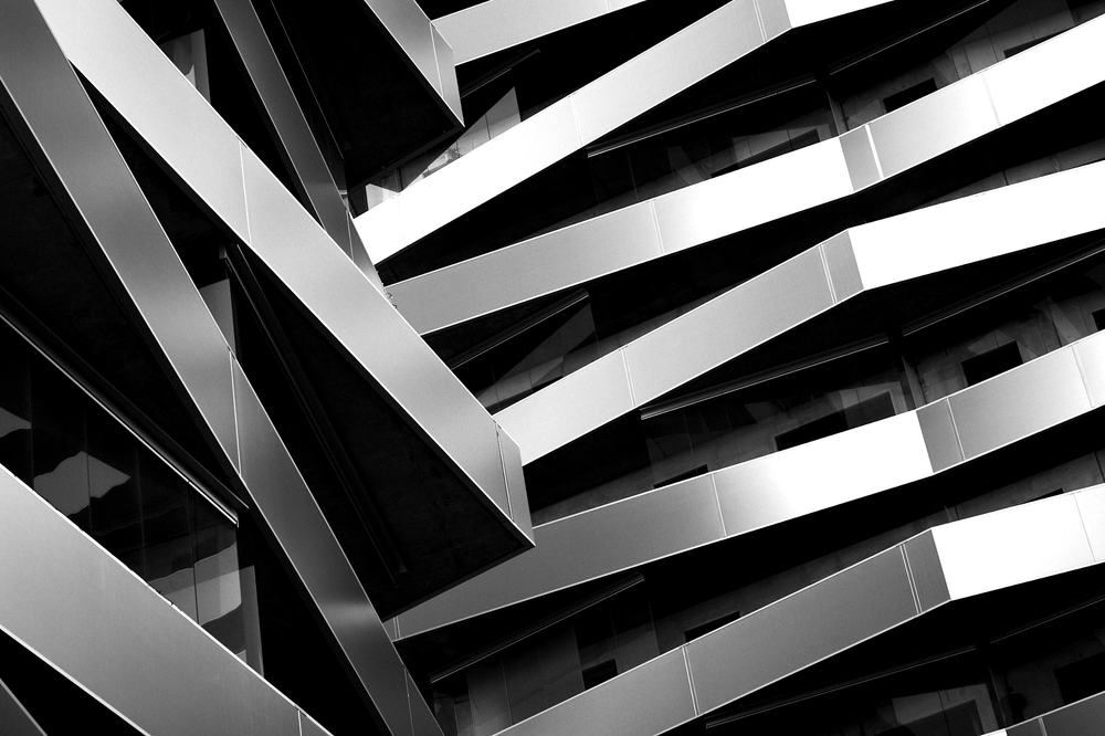 Close-up of angled metal fins on a building façade.